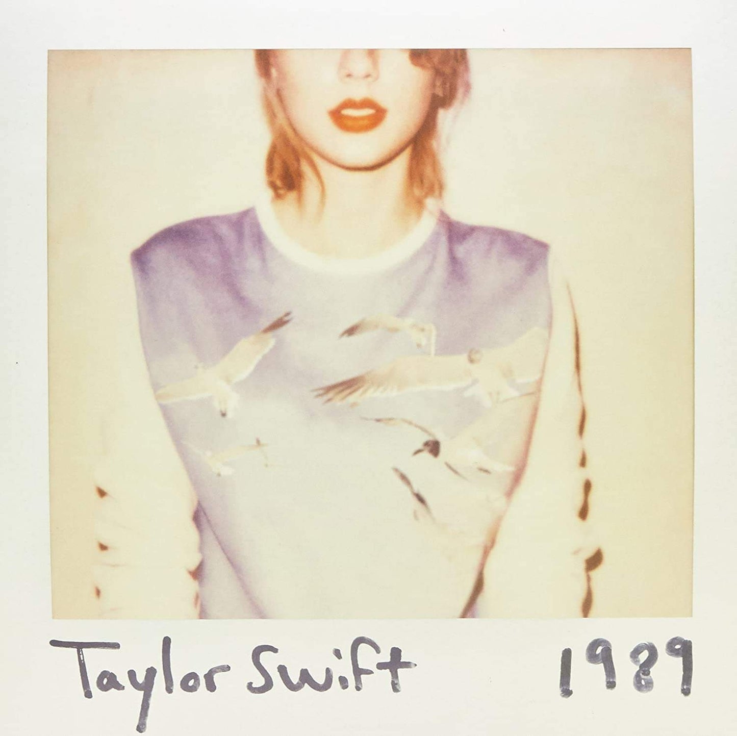 Vinyl album cover with portrait of a woman and hand-drawn text near bottom