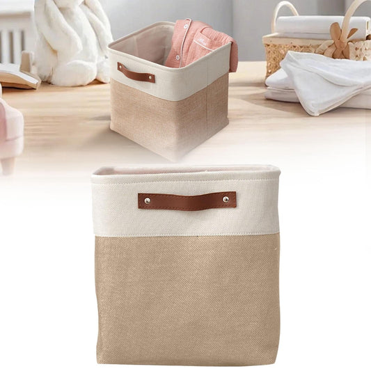 Beige fabric storage bag with zipper closure and leather handle tabs, rectangular