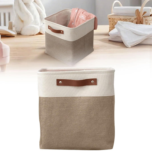 Two-tone fabric storage bag with white top, khaki-brown body, and brown handle tabs