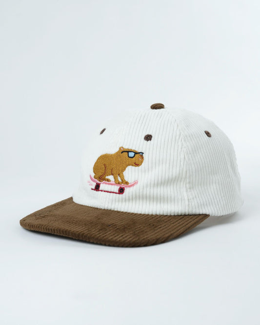White ribbed beanie hat with brown brim and skater rat graphic