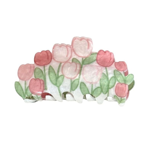 Medium acrylic cartoon hair claw clip with heart shapes and green leaf accents