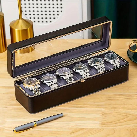 Dark watch box with open clear lid and cushioned slots holding six wristwatches