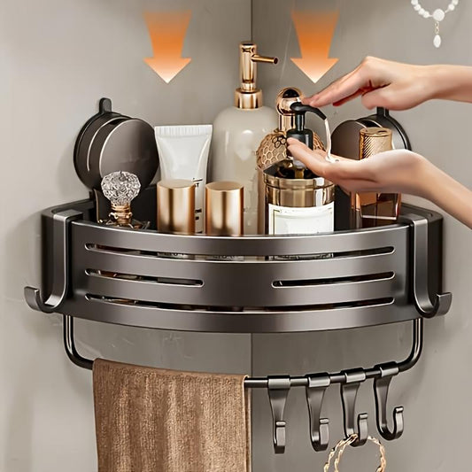 Triangular suction cup shower storage rack with slotted metal shelf and hanging hooks