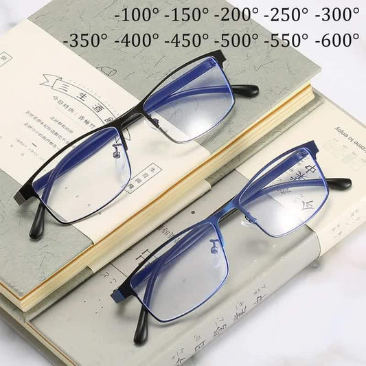 Two blue square eyeglasses with clear lenses and black temples, angled top view