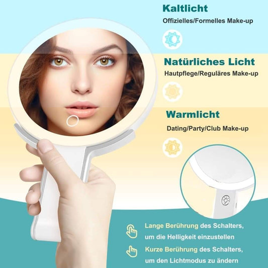 LED lighted round makeup mirror with magnifying face, held in hand, white