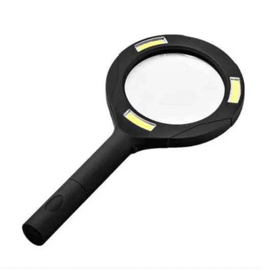 LED magnifying glass with black handle and bright light bars around lens