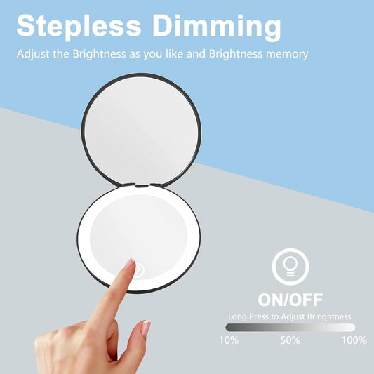 Black illuminated compact mirror with dimmable LED lights, open with finger pressing