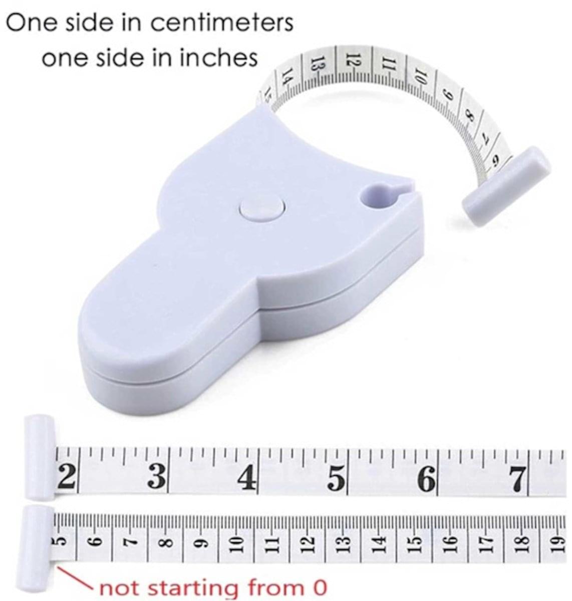 White measuring tape with centimeter and inch markings and sliding end guide