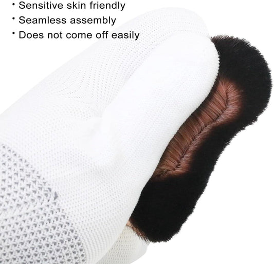 Foundation brush head with dark bristles under a white fabric cover
