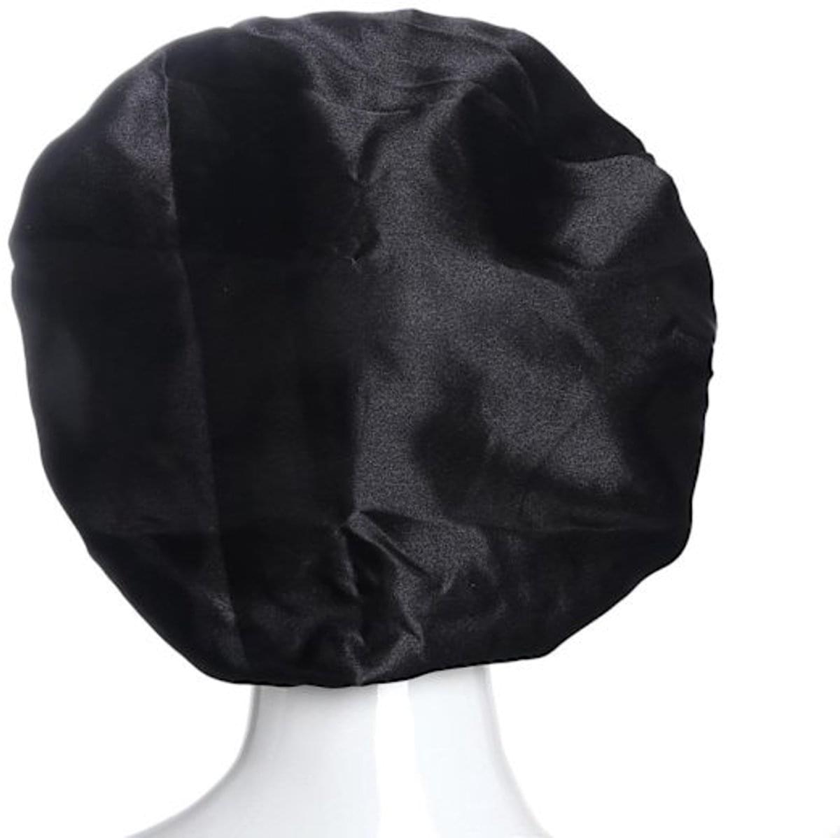 Black satin hair bonnet on head mannequin, smooth dome shape with subtle sheen