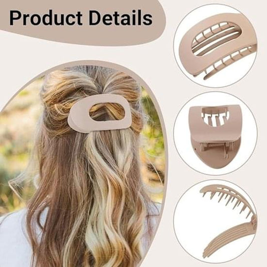 Cream flat hair clip with ridged inner teeth, oval opening