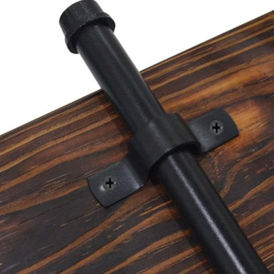 Black U-shaped metal pipe clamp fastening a wooden bar with two feet