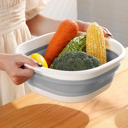 Foldable foot bath bucket filled with colorful spa items for foot soaking