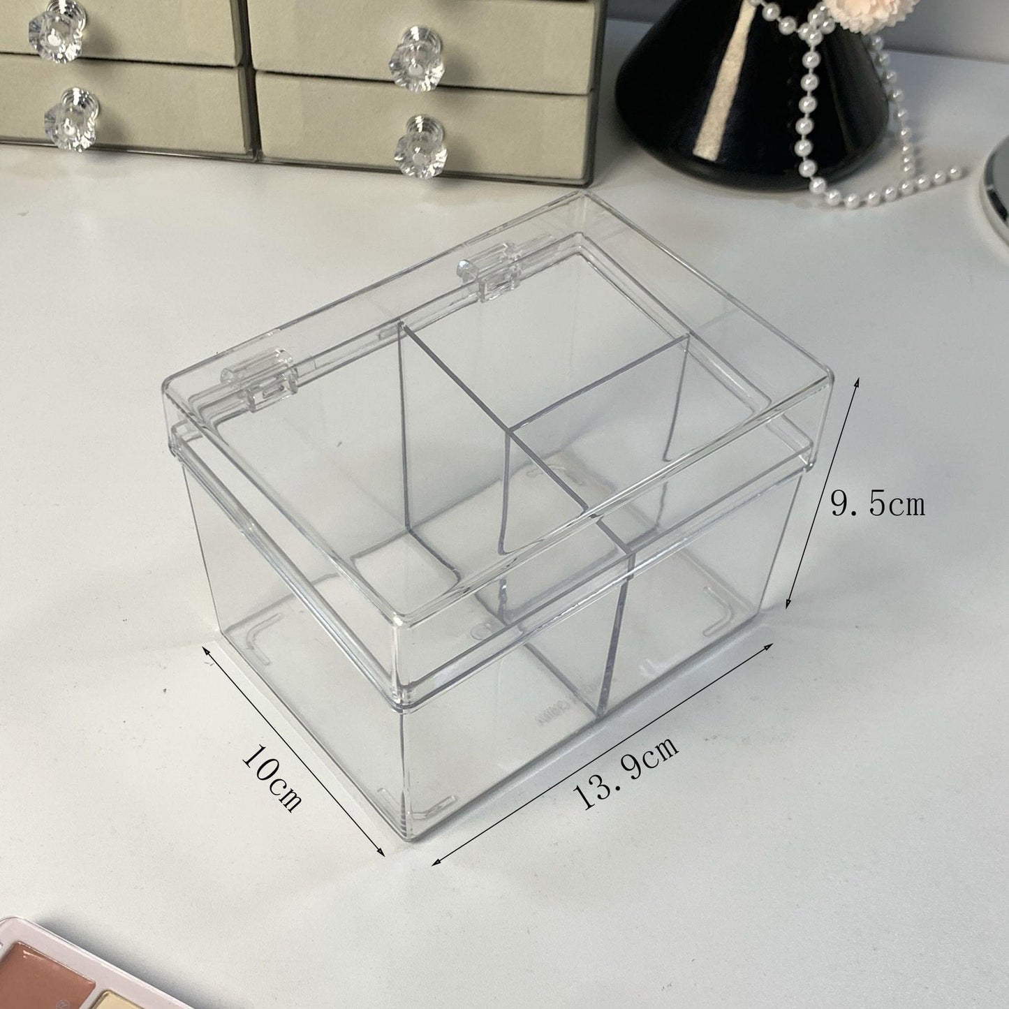 Clear three-compartment storage box, 13.9 x 10 x 9.5 cm