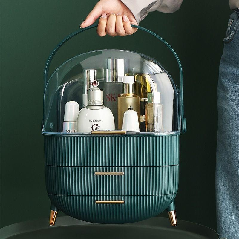 Transparent flip-top cosmetic storage box, deep green ribbed base with clear lid