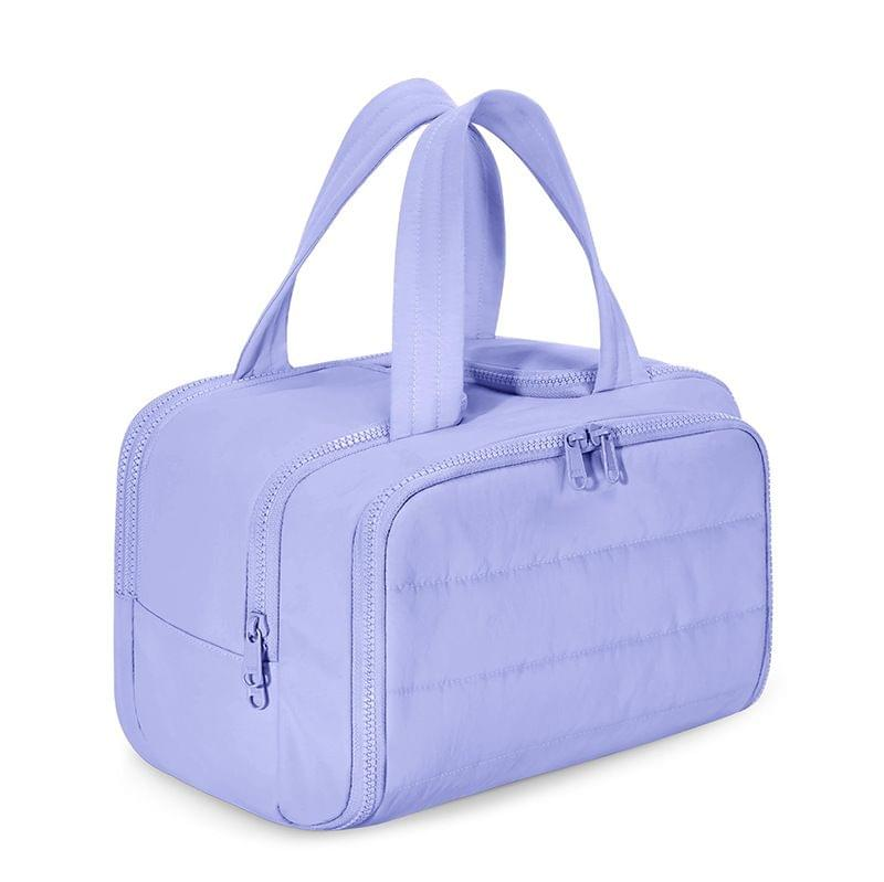 Large toiletry and makeup bag with top handles, zip compartments, lavender fabric