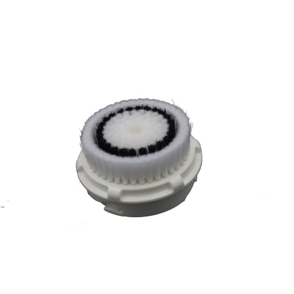 Round facial brush head with black-and-white bristle pad and pale gray base