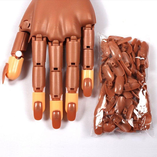 Tan nail practice hand with removable fingernails and spare set of tips
