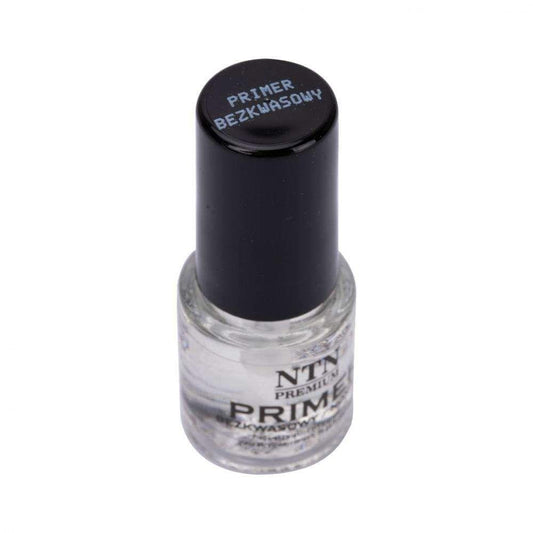 Transparent primer bottle with black cap, clear liquid, visible label text