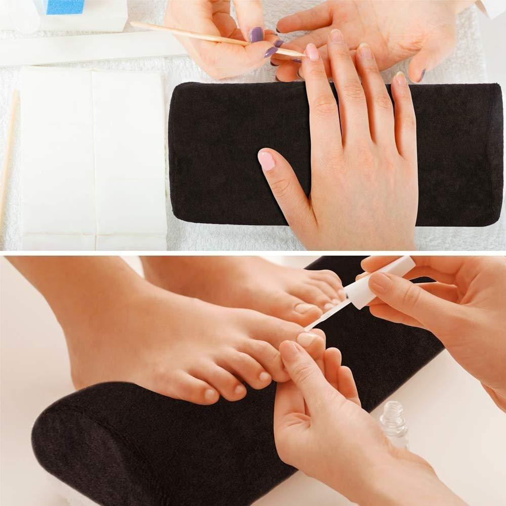Manicure wrist support cushion used under hands, black padded platform