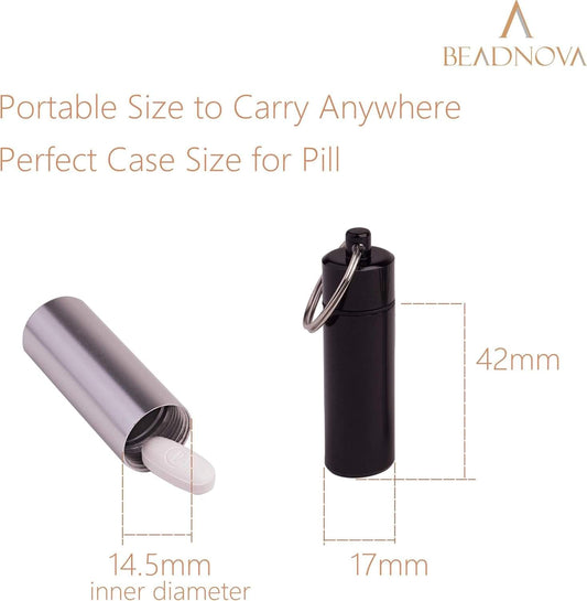 Small cylindrical pill holder with metal key ring, black aluminum case