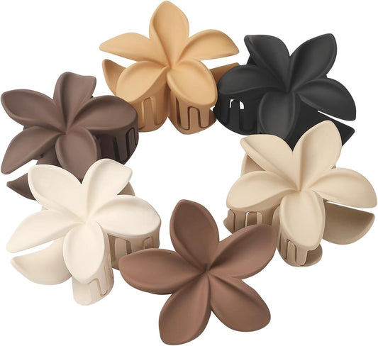 Flower claw hair clips in tan, black, brown, cream, and white