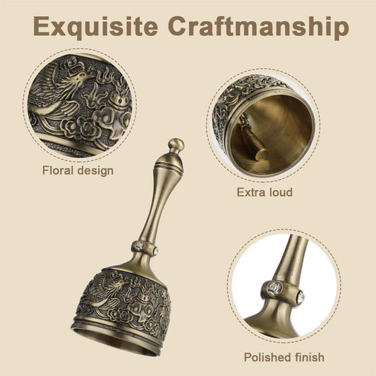 Brass hand bell with engraved dragon motif, polished finish, crystal ring detail