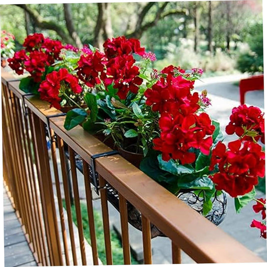 Artificial red geranium bouquet on long stems with green leaves