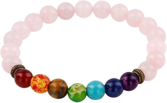 Pink round bead bracelet with multicolor center stones and bronze-tone spacer beads