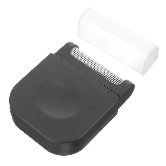 Compact fabric shaver in dark gray with perforated blade head and clear cover