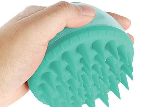 Green silicone scalp massager brush head with massage nubs and short bristles