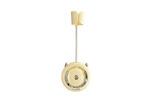 Adjustable hair dryer holder bracket with yellow top cradle and round base