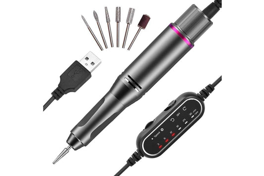 Cordless nail drill with gray body and set of sanding and polishing bits