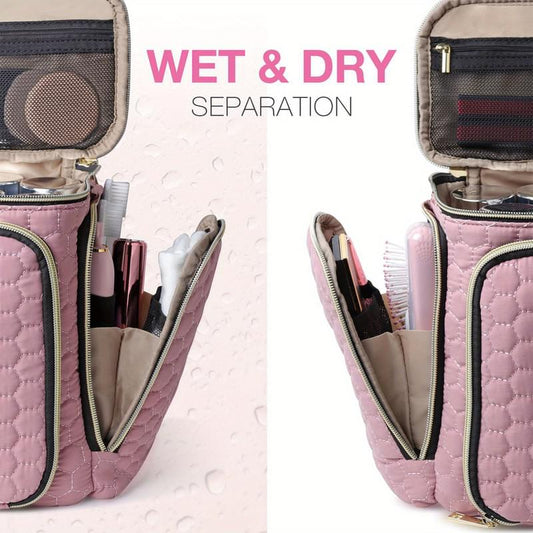 Pink toiletry bag open, showing compartments with separate zipped sections