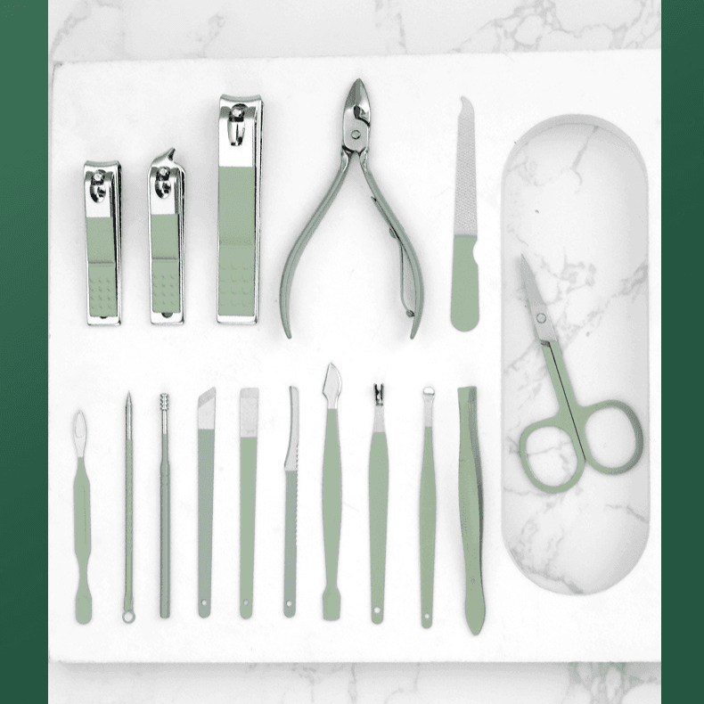 Complete nail care tool set laid out with clippers, scissors, files, and small implements