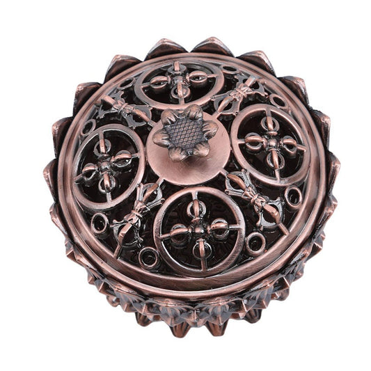 Brown lotus incense burner top view with central flower finial and ring engravings.