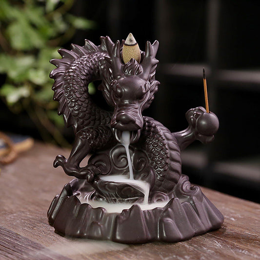 Ceramic dragon backflow incense burner with dark finish and incense cone