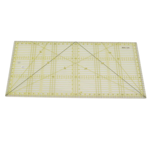 Clear quilting ruler with intersecting scale lines and large triangular corner markings