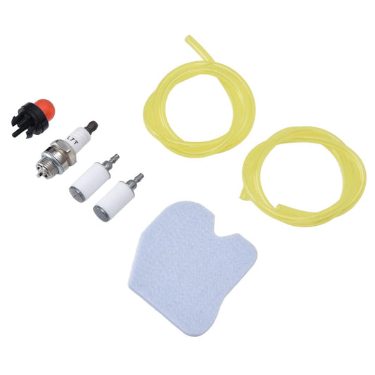 Chainsaw tune-up kit components: yellow fuel line, blue filter pad, spark plugs, small caps
