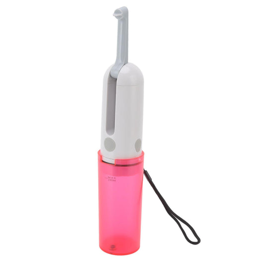 Portable bidet sprayer with upright white handle, pink reservoir, and black wrist strap