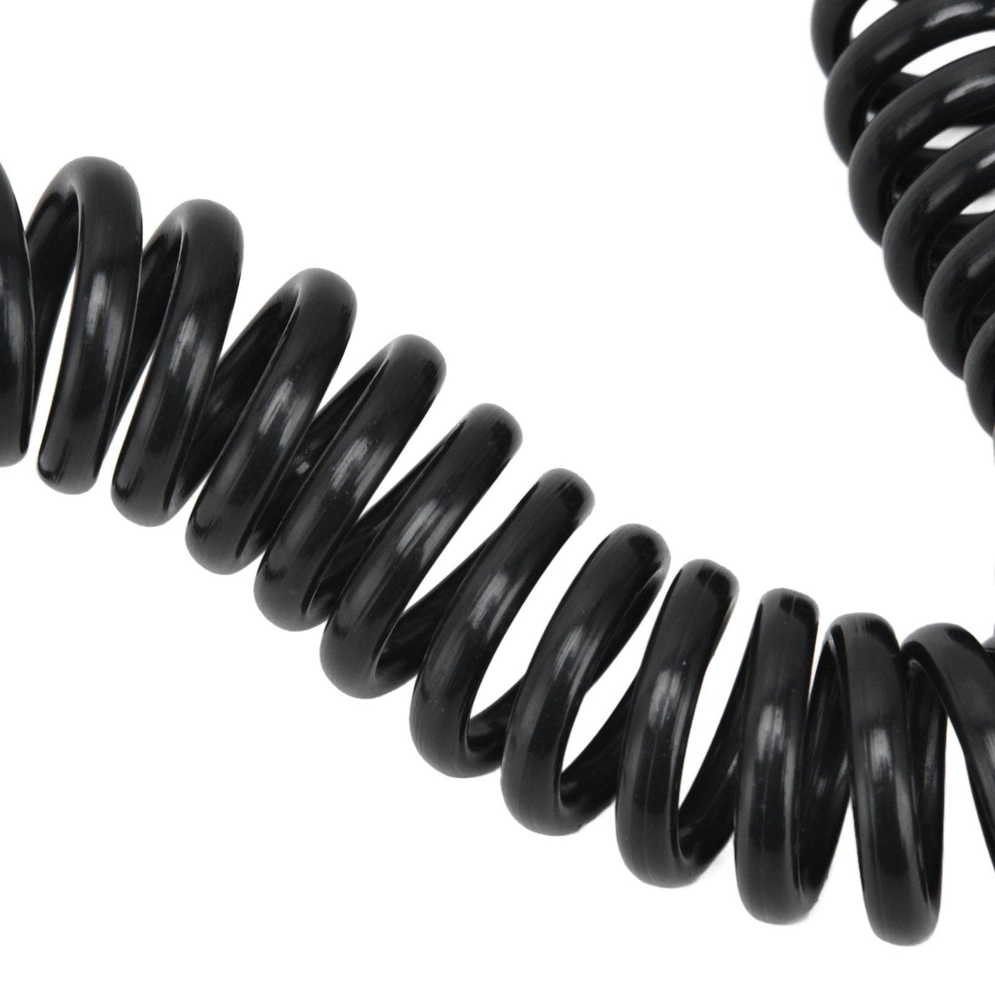 Black polyurethane coiled air hose with tight spiral loops