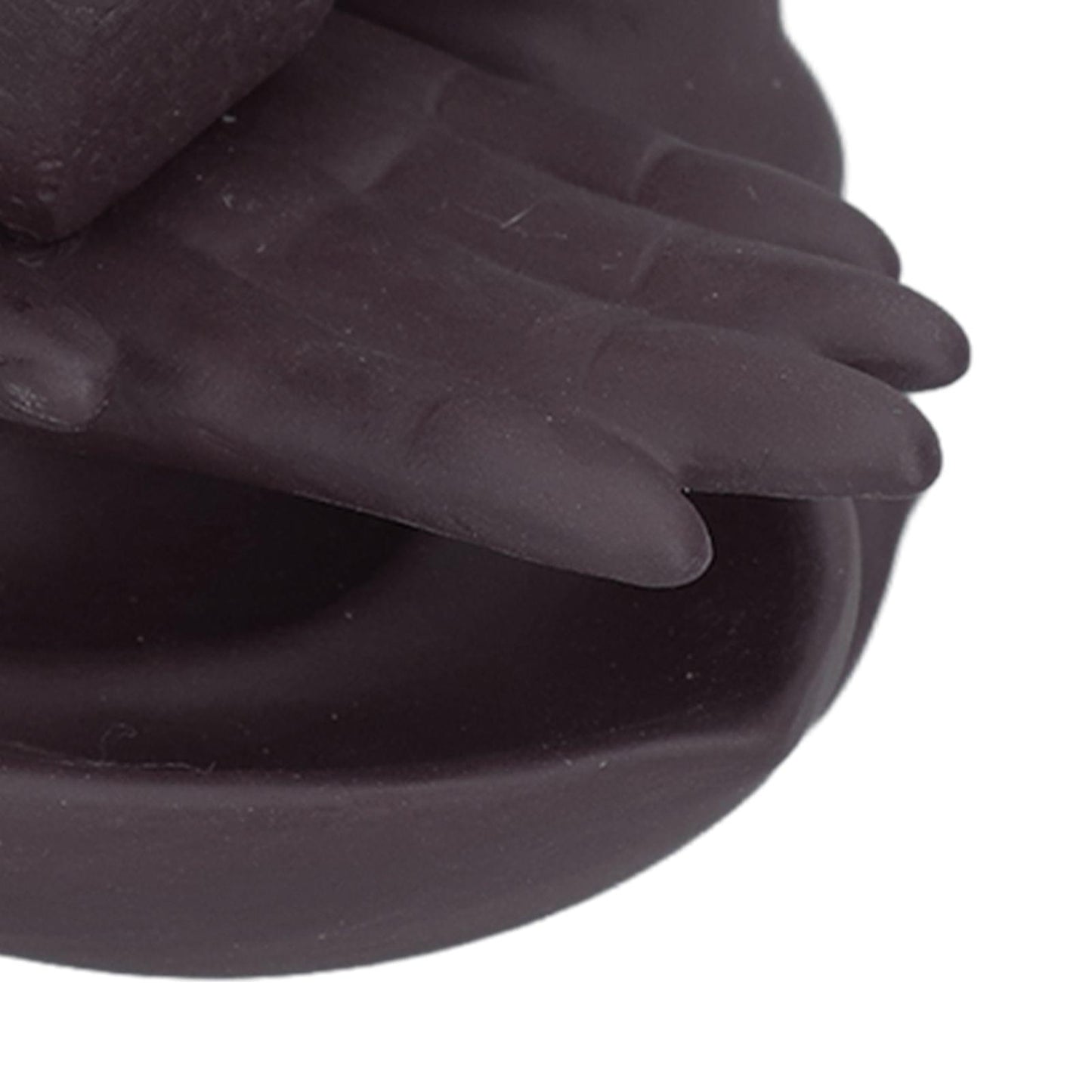 Ceramic incense burner base detail, dark purple matte finish