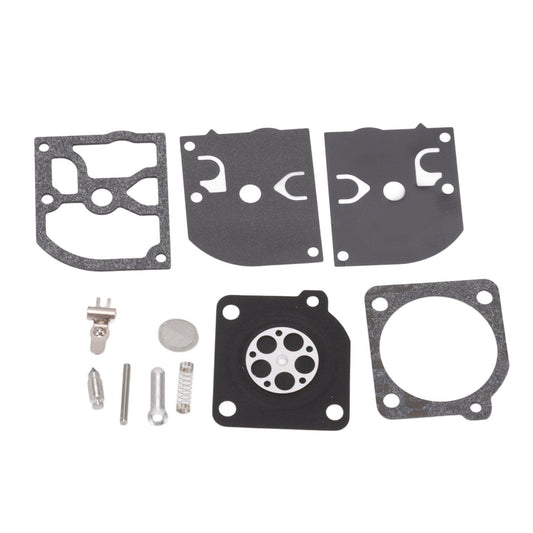 Carburetor diaphragm and gasket kit laid out: metal/paper seals and small screws