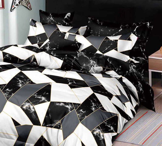 Super king duvet cover set with black and white geometric quilt pattern and matching pillow