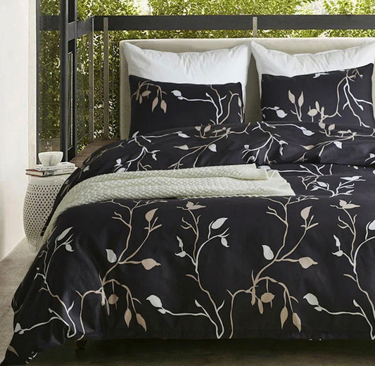 Black duvet cover set with white branch print and two matching pillowcases