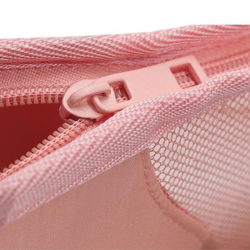 Pink cosmetic bag with zip track and plastic slider