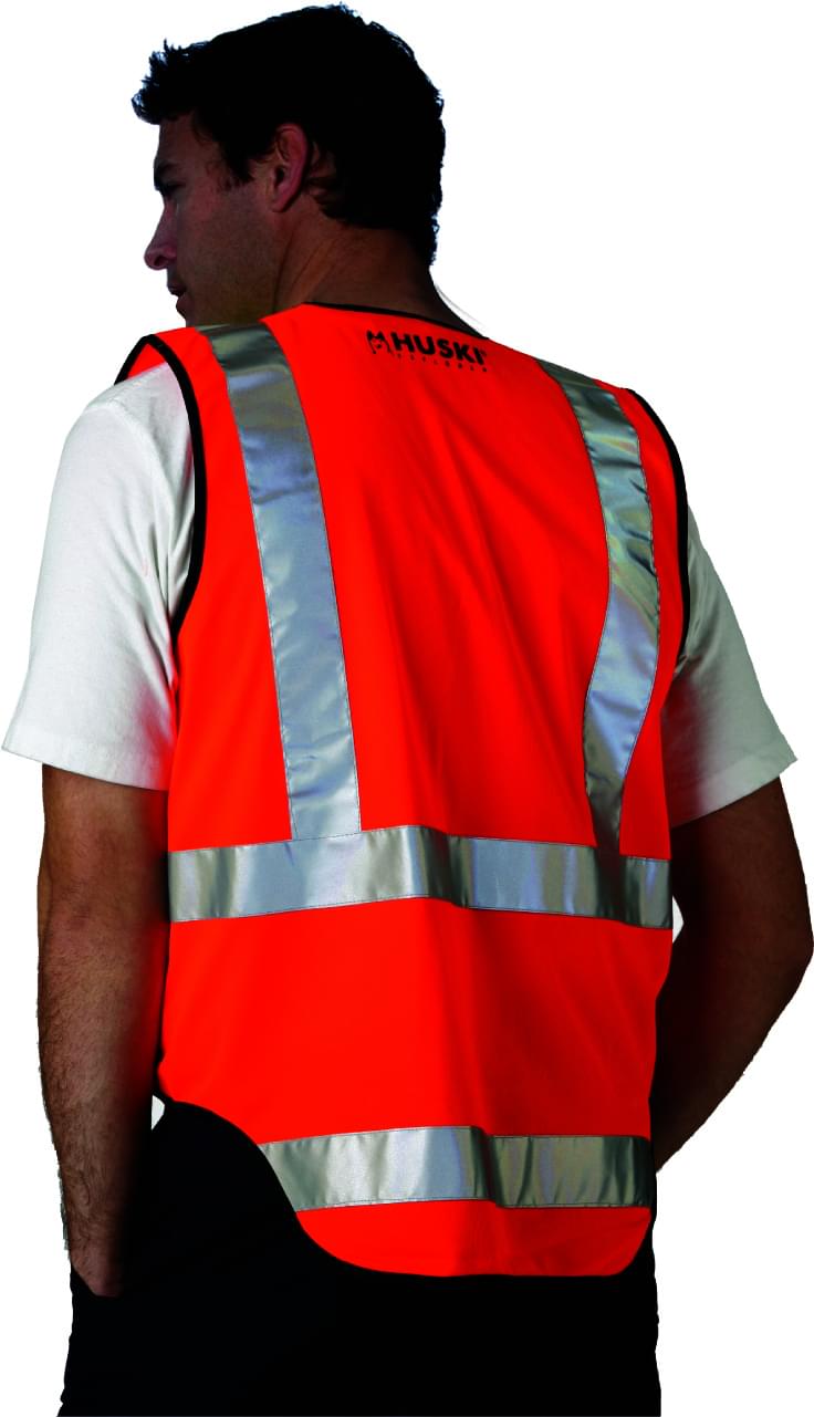 High-visibility safety vest with reflective bands worn over a T-shirt, side view