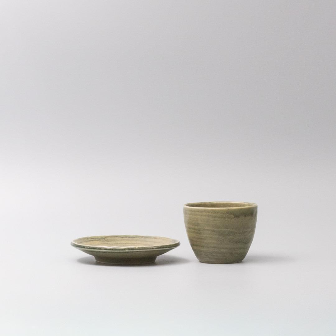 Washed fern saucer, 14 cm, olive glazed ceramic with ridged concentric pattern