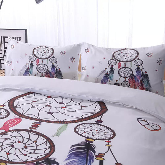Pair of white pillowcases with dreamcatcher circles, feathers, and small star accents