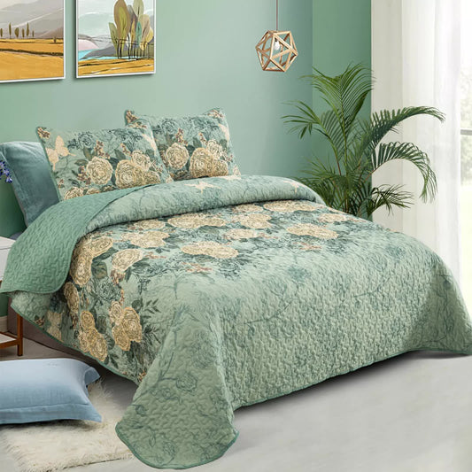 Quilted bedspread set with teal green base and beige rose floral pattern